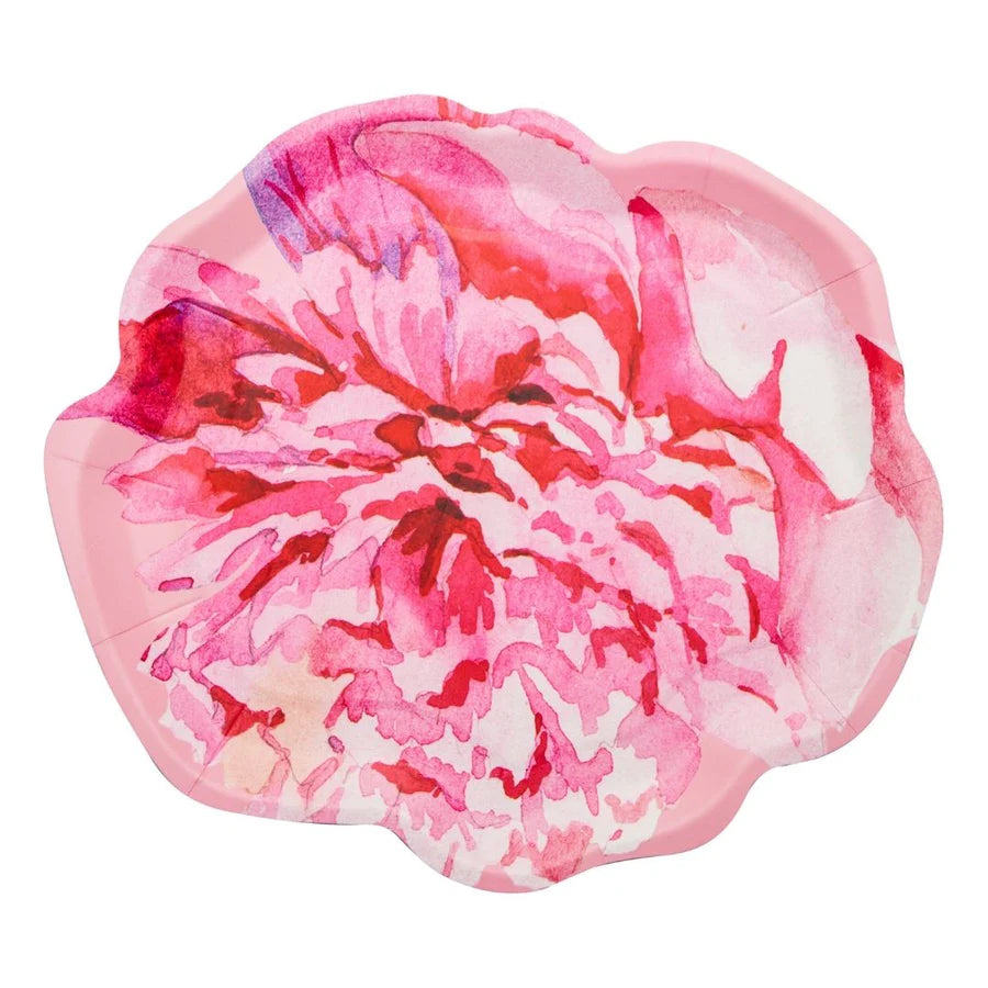 Heart-shaped pink and white floral cushion on a white background