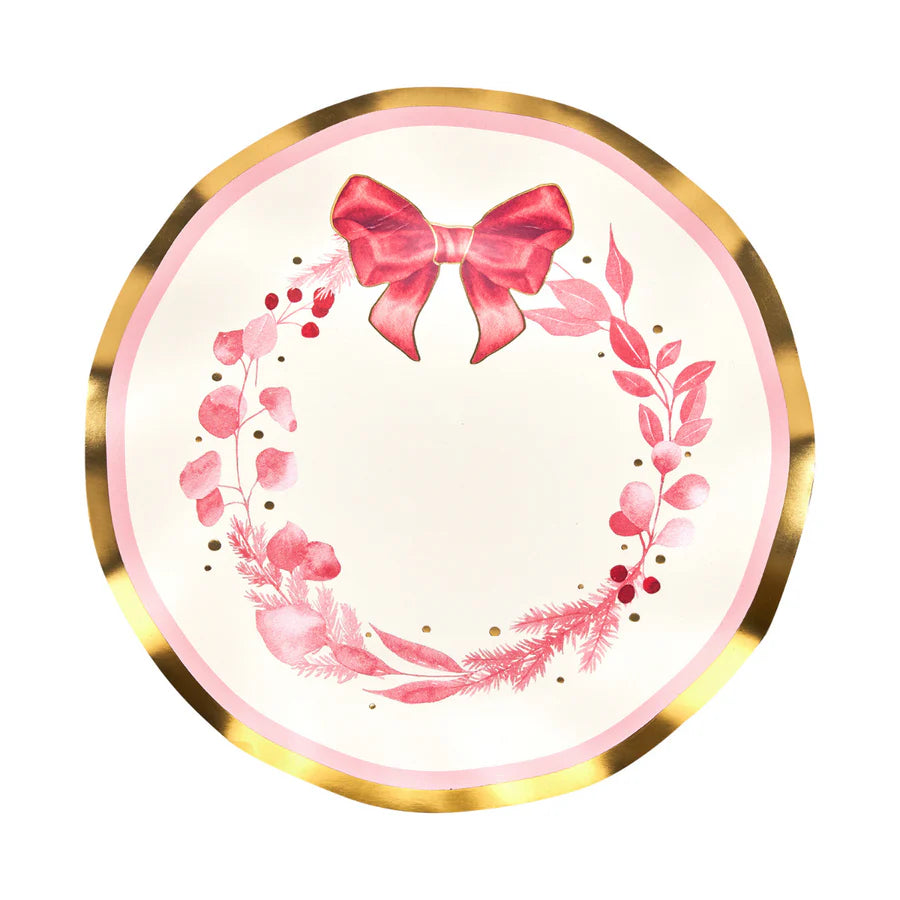 Decorative plate with a pink bow and floral design on a white background