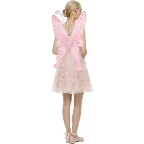 A young girl shown from the back wearing a pink fairy costume, featuring a short tulle dress and large pink butterfly wings with rhinestone embellishments, against a plain white background.