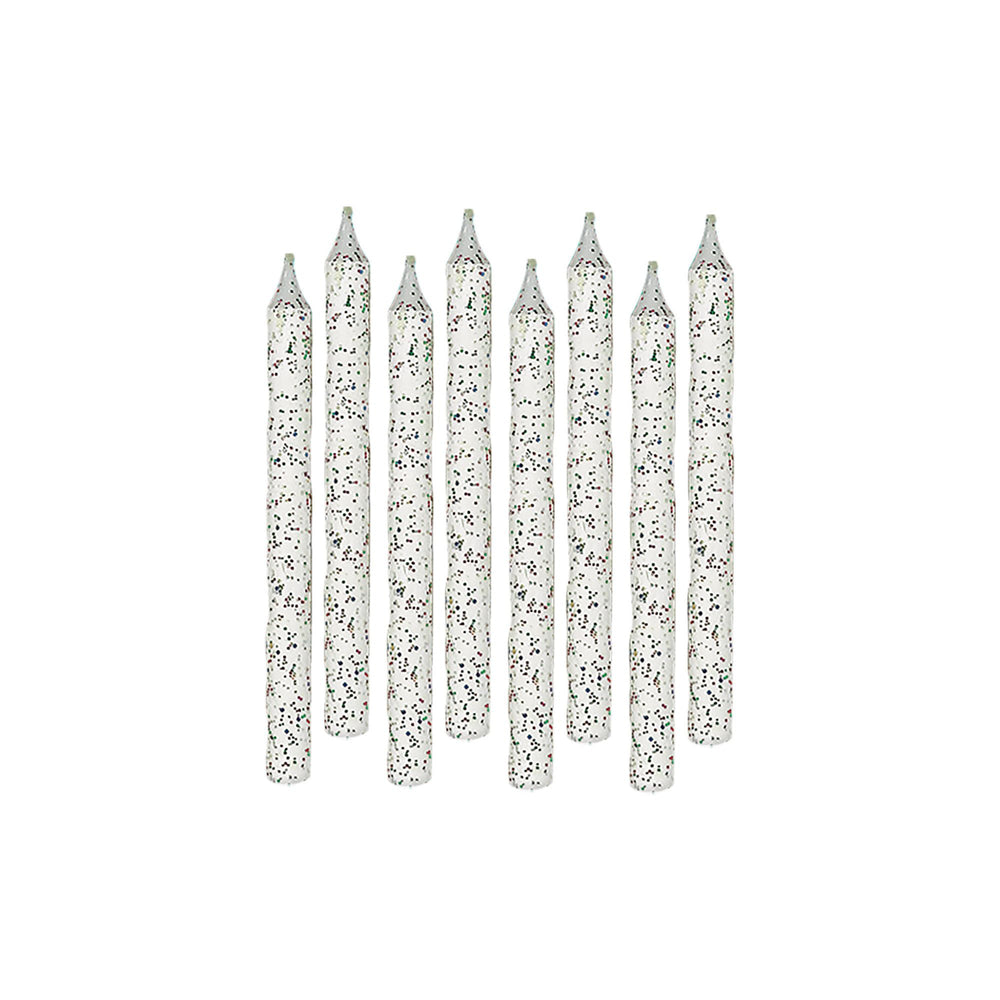 Set of silver glitter candles on a white background