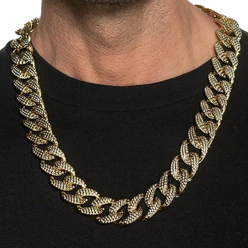 Gold chain necklace on a black background