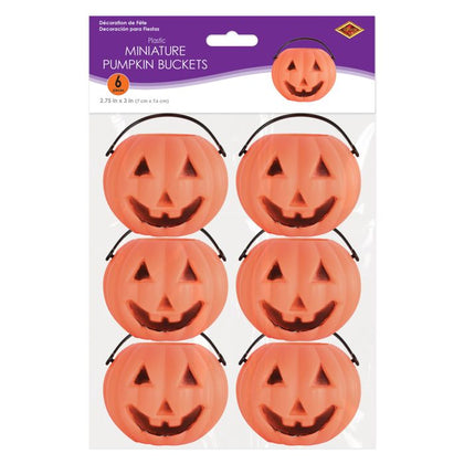 Pack of miniature pumpkin buckets with smiling faces on a white background
