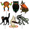 Set of Halloween-themed yard signs featuring a pumpkin, owl, witch, black cat, ghost, and skeleton.