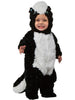 Child wearing a skunk costume on a white background