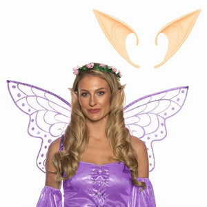 Woman in fairy costume with wings and ears on a white background