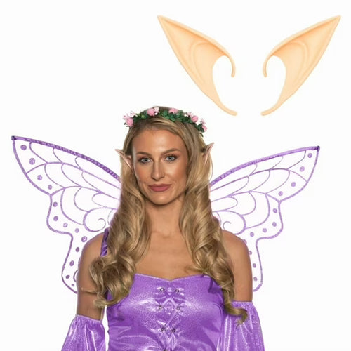 Woman in fairy costume with wings and ears on a white background