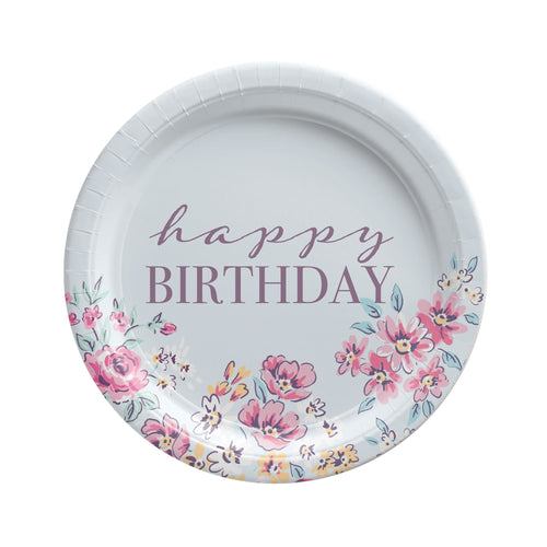 Paper plate with 'happy birthday' text and floral design on a white background