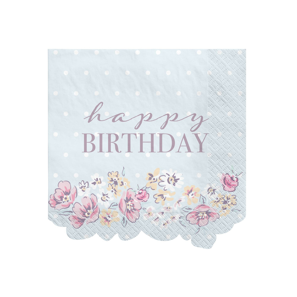 Napkin with 'happy birthday' text and floral design on a light blue background