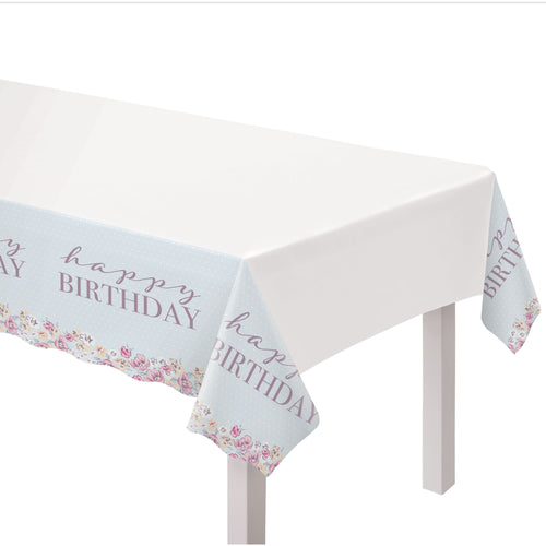 White tablecloth with 'Happy Birthday' print on a white background