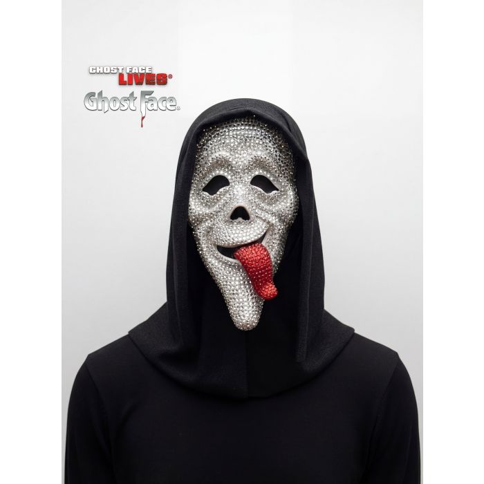 A person wearing a Ghostface 'Lives' costume mask and black hooded robe against a light gray background. The mask is silver with a red tongue and black eye sockets, and the Ghostface 'Lives' logo is visible in the upper left.