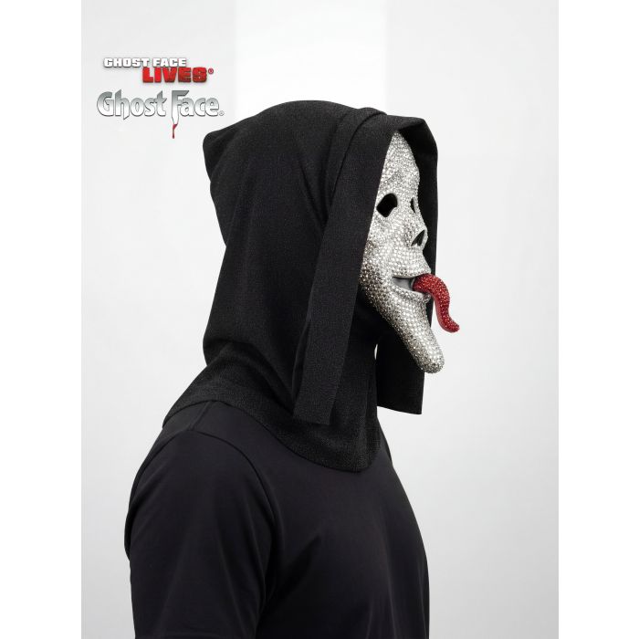 A person wearing a Ghost Face hooded mask costume, featuring a black hoodie and a silver rhinestone mask with a red tongue, shown against a light gray background with the Ghost Face Live! logo in the top left.