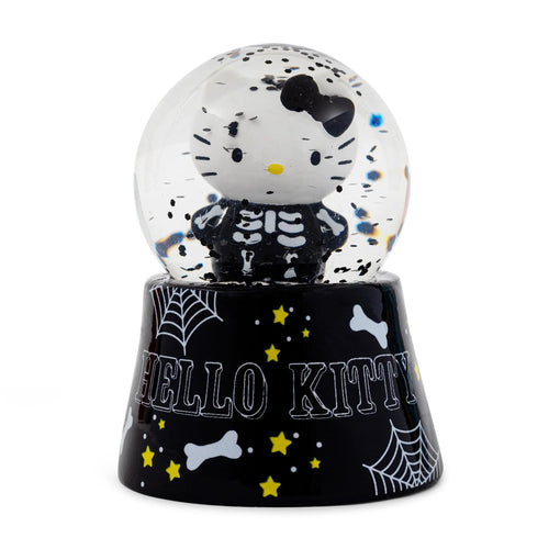 Hello Kitty skeleton snow globe with black and white design on a white background