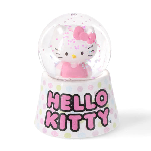 Hello Kitty snow globe with a white base and colorful polka dots.