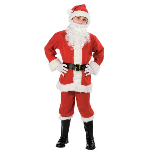 A child modeling a Santa Claus costume consisting of a red jacket and pants with white faux fur trim, a matching red hat, a white beard wig, a black belt with a gold buckle, and black boots, photographed against a solid white background.