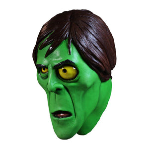 Green mask with brown hair on a white background