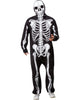 Person wearing a black skeleton onesie on a white background