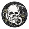 Decorative skull design with floral elements on a black background