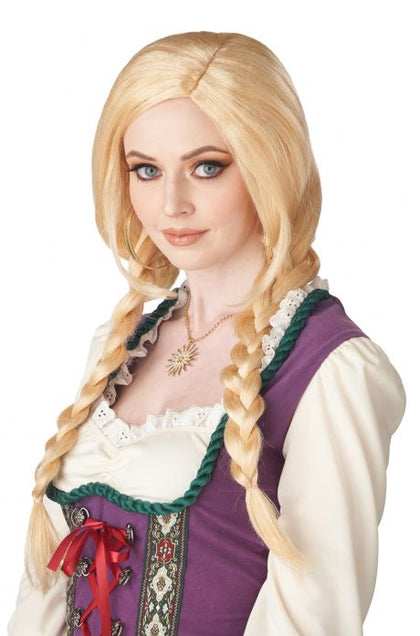 Person wearing a costume with blonde wig and traditional outfit on a white background
