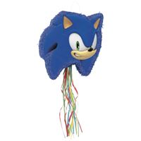 Blue character-shaped pull toy with colorful tassels on a white background
