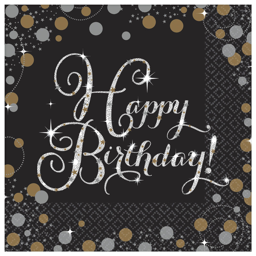 Napkin with 'Happy Birthday!' text on a black background with gold and silver confetti