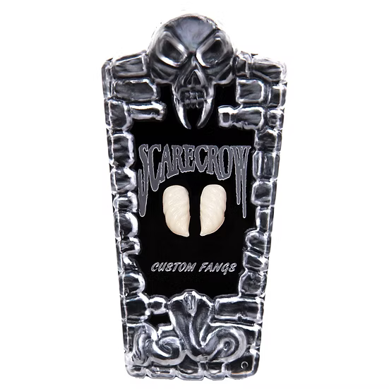 A black and silver coffin-shaped display stand featuring a skull at the top, the words 'SCARECROW' and 'CUSTOM FANGS', and two cream-colored custom teeth mounted in the center, shown on a plain white background.