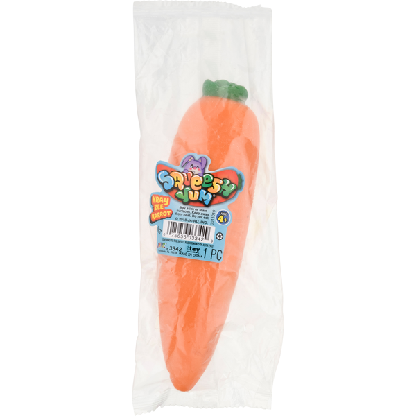 Carrot-shaped candy in a clear package with a colorful label on a white background