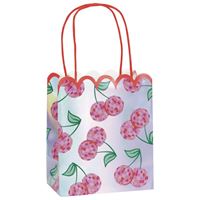 Small gift bag with floral design and pink handles on a white background