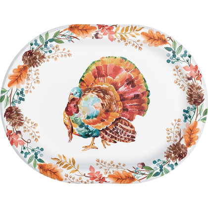 Decorative plate with a turkey and autumn leaves design on a white background