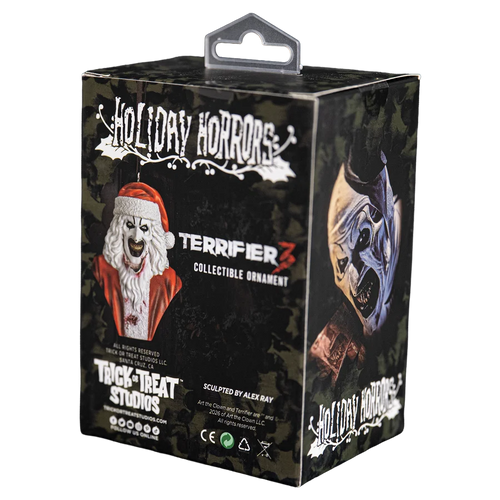 Terrifier 3 Holiday Horrors collectible ornament packaging box by Trick or Treat Studios, featuring a black camouflage design with Santa and a mask illustration.