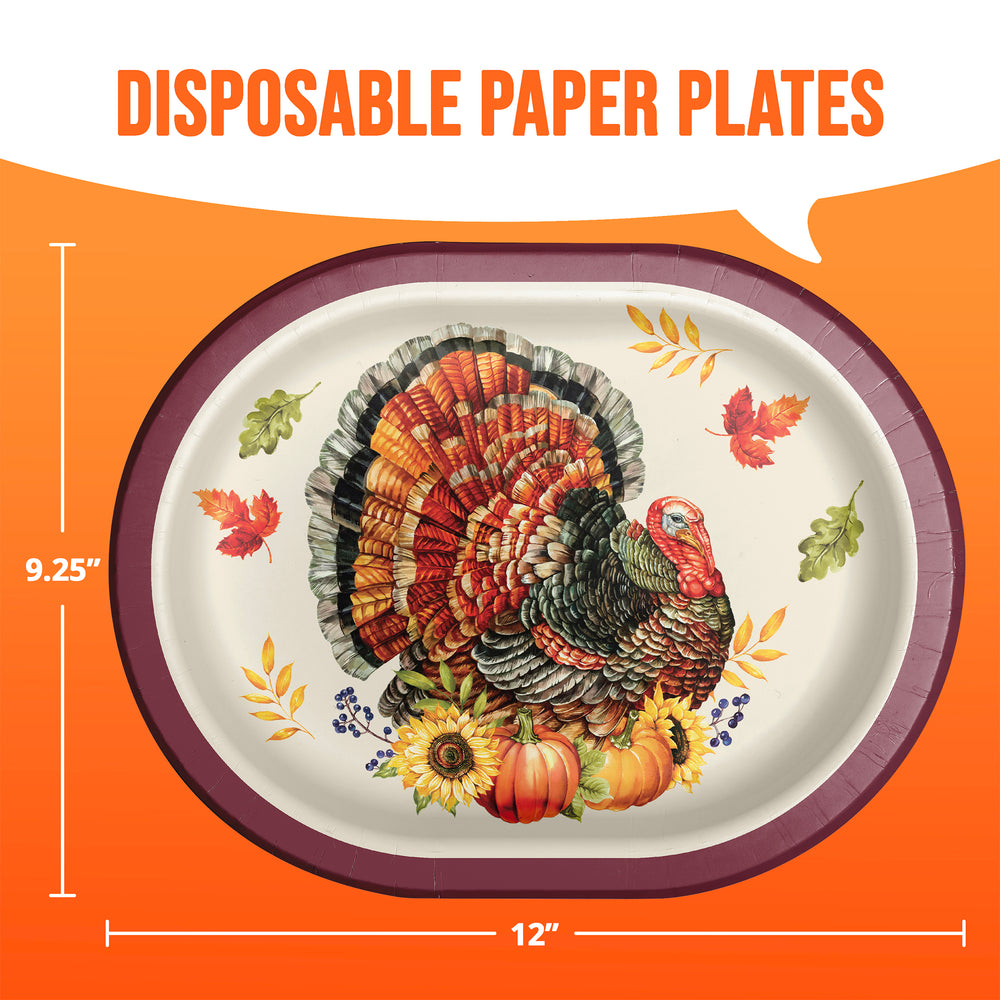 An oval disposable paper plate with a turkey and autumn harvest illustration, shown on an orange background with measurement lines indicating 12 inches by 9.25 inches.