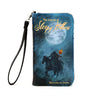 Wallet with 'The Legend of Sleepy Hollow' design featuring a ghost and horse, on a blue background.