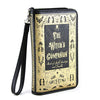 Book-shaped wallet with 'The Witch's Companion' design on a white background