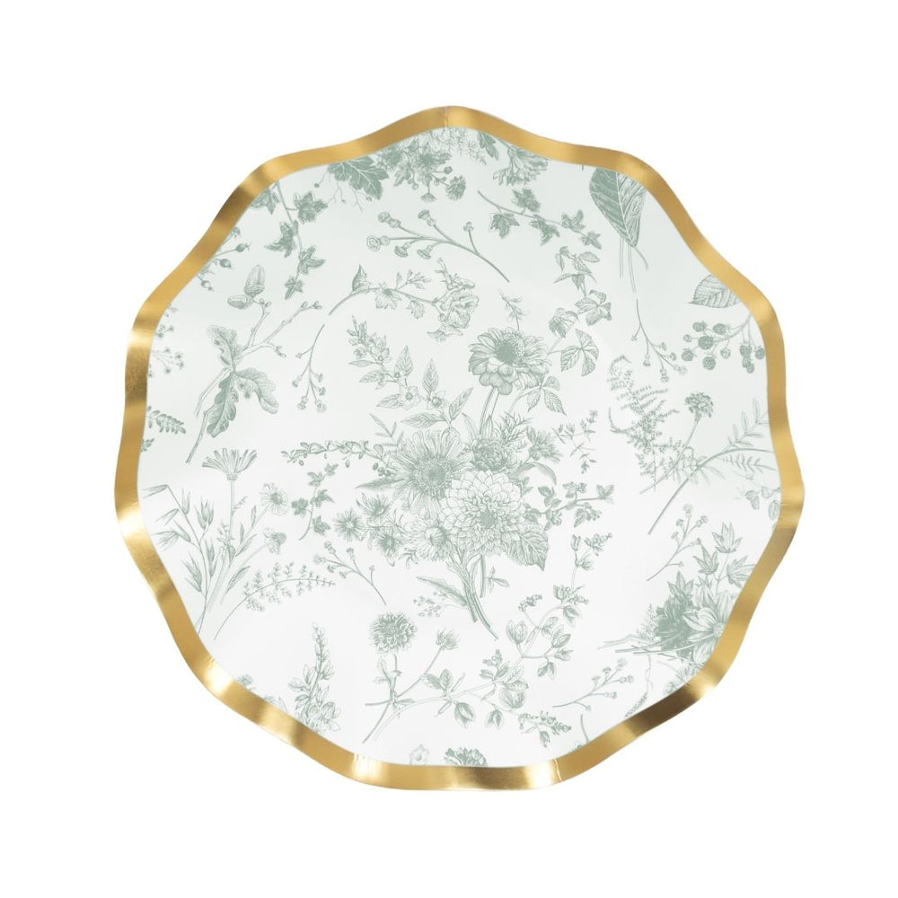 Decorative plate with floral pattern and gold rim on a white background