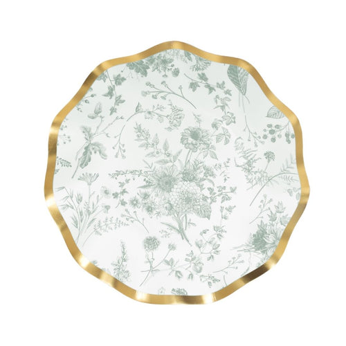 Decorative plate with floral pattern and gold rim on a white background