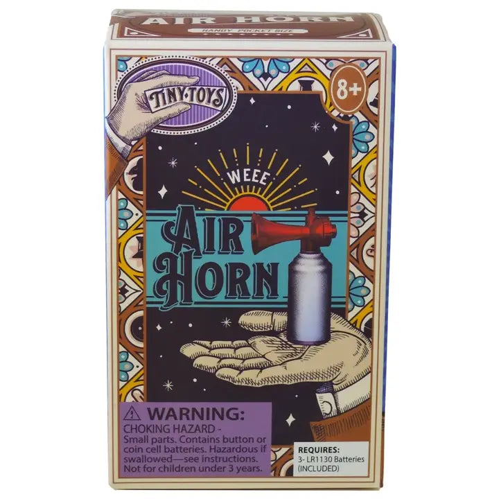 Tiny Toys Air Horn toy packaging box, featuring a retro-style illustrated design with a hand holding a spray bottle that transforms into an air horn, set against a white background.