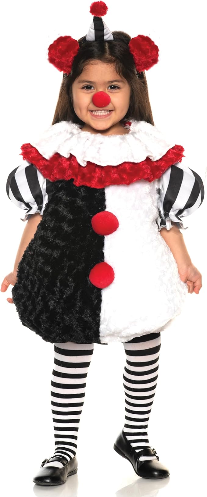 Child wearing a clown costume with black, white, and red colors.