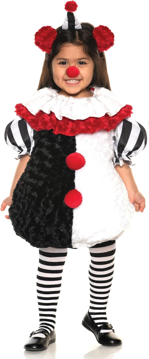 Child wearing a clown costume with black, white, and red colors.