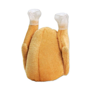 Plush toy resembling a roasted turkey on a white background