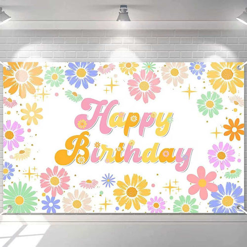 Colorful 'Happy Birthday' banner with flowers on a white brick wall background