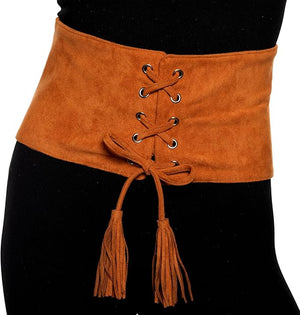 Brown suede corset belt with tassels on a black background