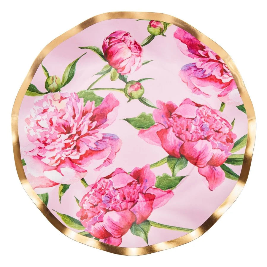 Round plate with pink floral design and gold rim on a white background
