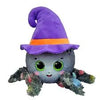 Toy with a purple witch hat and green eyes on a white background