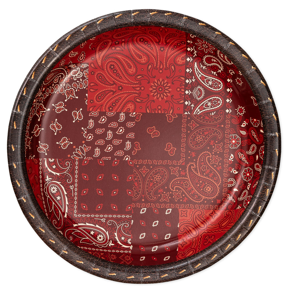 Round paper plate with red and white paisley pattern on a white background