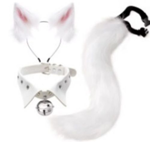 Cat-shaped bell collar with a white body and black accents on a white background