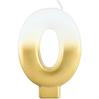 Gold letter 'Q' candle on a white background