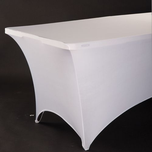 White spandex table cover on a black background