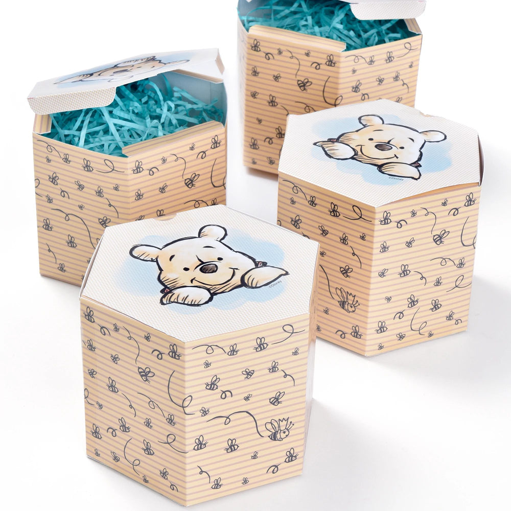 Three wooden boxes with teddy bear designs on a white background