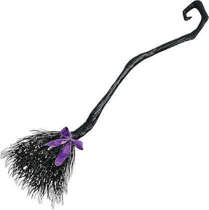 Black witch broom with a purple handle on a white background