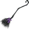 Black witch broom with a purple handle on a white background