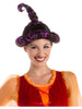 Person wearing a colorful wig with a white background